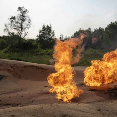 A burning flare is visible at an oil extraction area located in Moanda, Democratic Republic of the Congo, December 23, 2023.
