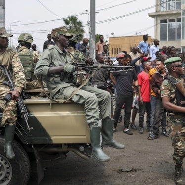Members of the Rwandan-backed M23 armed group in a vehicle.
