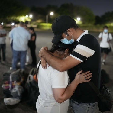 Asylum seekers embrace upon arriving in Panama City, Panama