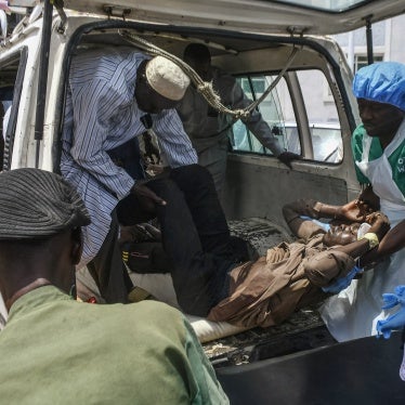 A victim of a recent wave of suicide attacks arrives for treatment at a hospital in Maiduguri on June 29, 2024.