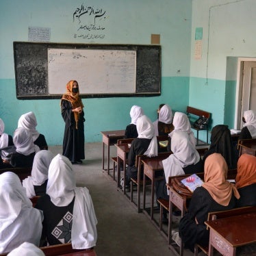 Afghan girls attend a class after their school reopened in Kabul on March 23, 2022. Hours later, the Taliban ordered girls' secondary schools shut.