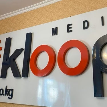 Kloop Media sign in the office of Kloop Media Public Foundation. 