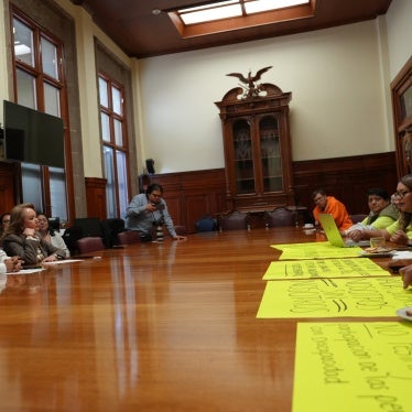 Martha García and a group of representatives from organizations of people with disabilities meet in a Mexico Supreme Court chamber with Justice Hugo Aguilar Ortiz and Justices Lenia Batres and Yasmín Esquivel.