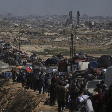 Displaced Palestinians flee northern Gaza along the coastal road toward the south, after Israel's military escalated its assault on Gaza City and warned residents to leave, September 16, 2025.