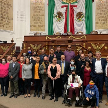 People standing in Mexico City Congress