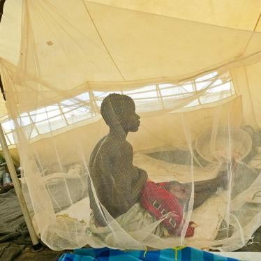 Nyanial, 22, nurses one of her three children in the UNMISS camp near Bentiu in June. Soldiers and militia attacked her town in Koch county in May 2015. 
