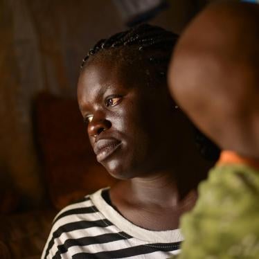 Fatma W. with her 7-year old son born from rape.