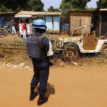 A United Nations peacekeeper stands alongside a road near the refugee camp of Saint Sauveur, in the Central African Republic capital, Bangui, November 29, 2015.
