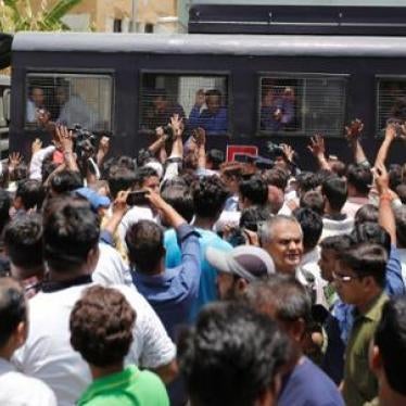 A police van transports some of those convicted in connection with the 2002 riots in Gujarat, India on June 2, 2016. 