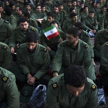 Members of the revolutionary guard attend the anniversary ceremony of Iran's Islamic Revolution at the Khomeini shrine south of Tehran on February 1, 2012.