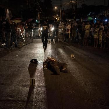 Police personnel at a crime scene after unidentified gunmen on motorcycles fatally shot Edgardo Santos in the head at about 4:30 p.m. in Mandaluyong, Metro Manila, November 11, 2016.