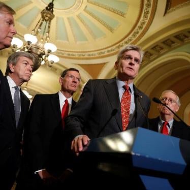 Sen. Bill Cassidy (R-LA), accompanied by Sen. Lindsey Graham (R-SC), Sen. Roy Blunt (R-MO), Sen. John Barrasso (R-WY) and Senate Majority Leader Mitch McConnell, speaks with reporters following the party luncheons on Capitol Hill in Washington, U.S., Sept