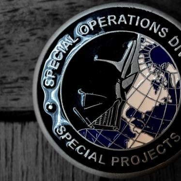 Medallion that includes the words ‘Special Operations Division’ with an image of Darth Vader over the globe on one side, and the words ‘Drug Enforcement Administration’ and the DEA logo on the other side. 