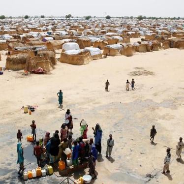 Children fetch water from a borehole point at an internally displaced persons (IDP) camp on the outskirts of Maiduguri, northeast Nigeria June 6, 2017. REUTERS/Akintunde Akinleye