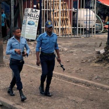 Police officers patrol along a road in Addis Ababa, Ethiopia, February 21, 2018. © 2018 Reuters