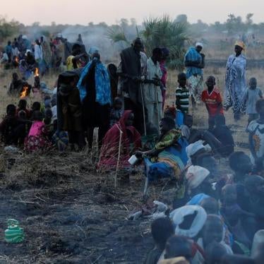 People wait to be registered prior to a food distribution carried out by the United Nations World Food Programme (WFP) in Thonyor, Leer state, South Sudan, February 25, 2017.