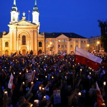 People gather in front of the Supreme Court during a protest against the Supreme Court legislation in Warsaw, Poland, July 22, 2017. 