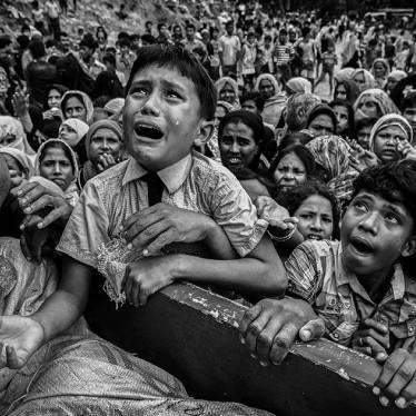 A photo of a child extending his hand to ask for help.