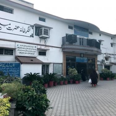 Women walk out of a community center of the Ahmadiyya community in Rabwah, Pakistan, October 19, 2017.