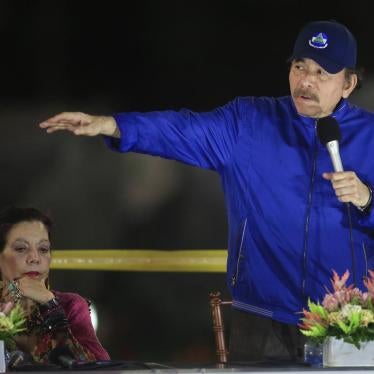 Nicaragua's President Daniel Ortega speaks next to first lady and Vice President Rosario Murillo during the inauguration ceremony of a highway overpass in Managua, Nicaragua, Thursday, March 21, 2019