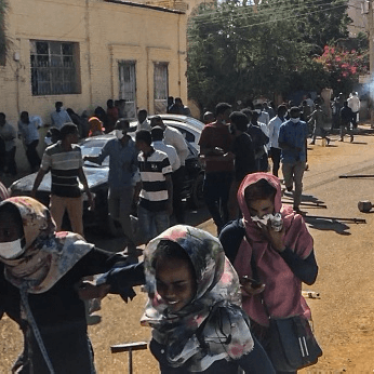 Sudanese protesters cover their faces during an anti-government demonstration in the capital Khartoum on January 6, 2018. © 2018 Getty Images