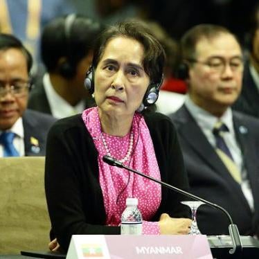 Myanmar State Counsellor Aung San Suu Kyi listens to China Premier Li Keqiang at the ASEAN-China Summit during the 33rd ASEAN Summit on November 14, 2018 in Singapore. 