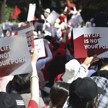 Women protest to demand stronger government action to fight the spread of intimate photos and footage taken by hidden cameras in Seoul, South Korea, July 7, 2018.