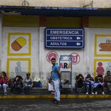 Relatives of patients that are treated at the University Hospital wait in front of the building in Barquisimeto, Venezuela on April 24, 2019.