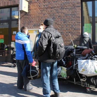 Life on the street: A gathering outside the Bahnhofsmission Zoo, Berlin, Germany. 